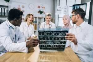 Doctors collaborating to avoid diagnostic overshadowing and reduce medical errors