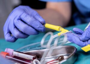Nurse preparing subcutaneously for palliative care in a hospital, conceptual image